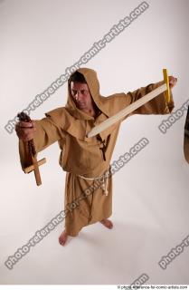 18 2018 01 JOEL ADAMSON MONK WITH CRUCIFIX AND SWORD